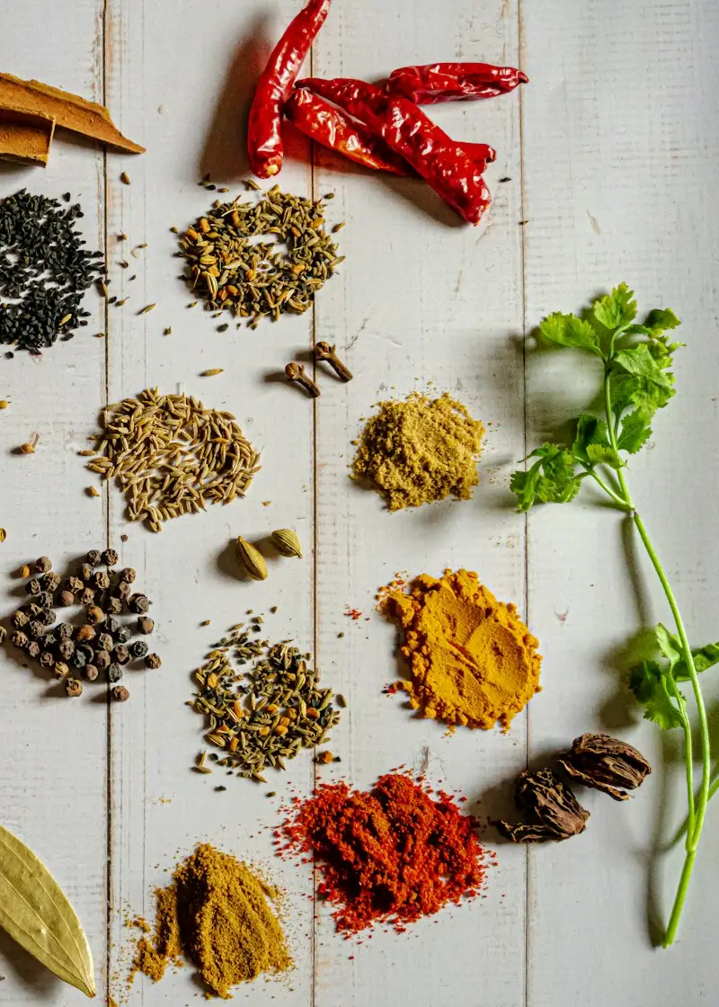Whole spices and ingredients laid out on a table